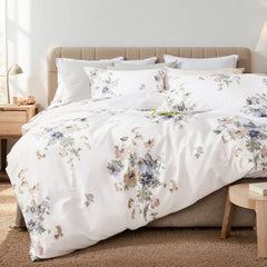 A close-up of the white garden floral duvet cover set showing fabric texture