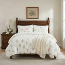 wildflower meadow duvet cover set styled on bed with wooden headboard rustic bedroom