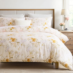 Angled shot of the comforter set showing the full bed with two pillows