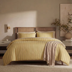 Full front view of yellow striped bedding set