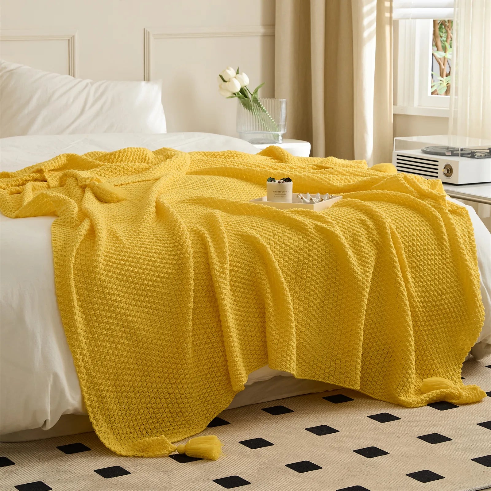 Yellow Knitted Throw Blanket on Bed with Retro Decor and Window Light