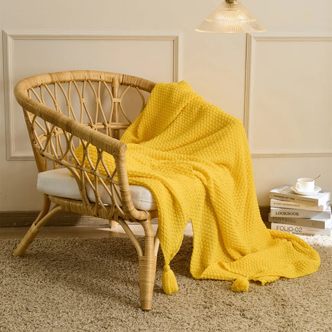 Yellow Knitted Throw Blanket on Rattan Chair with Tassels Boho Decor
